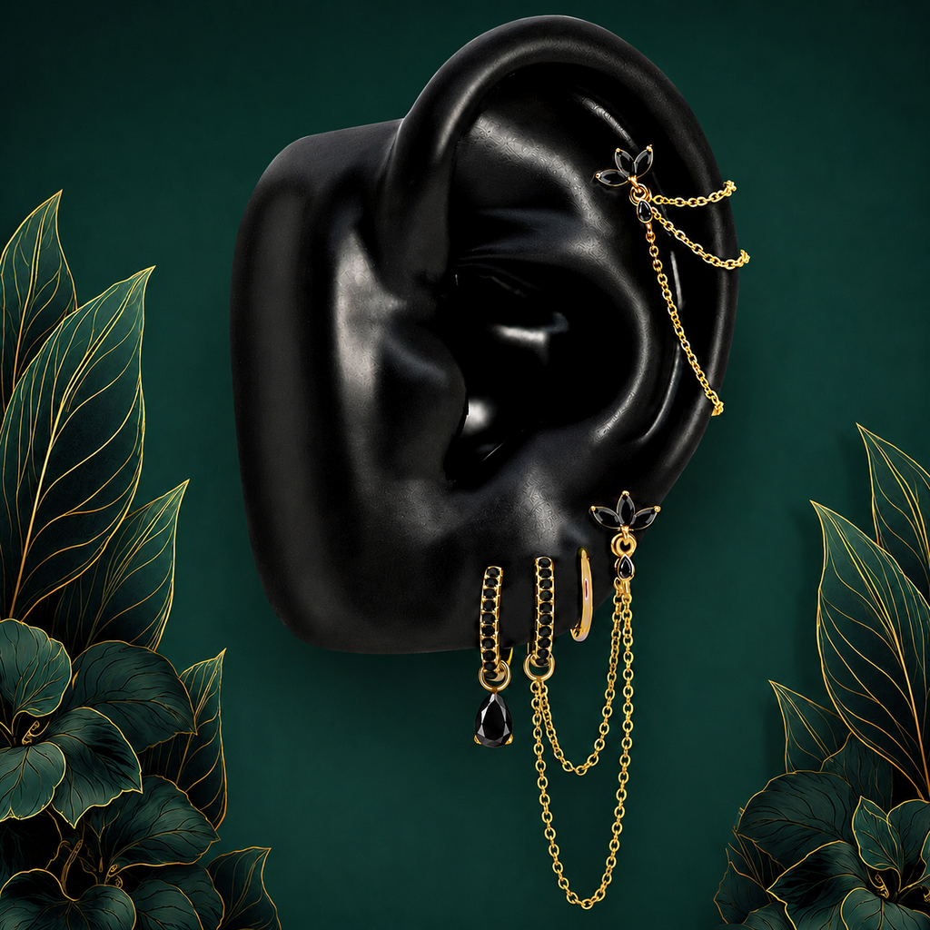 IMBER Eternal Black earring stack in gold with black stones and chains, on ear display
