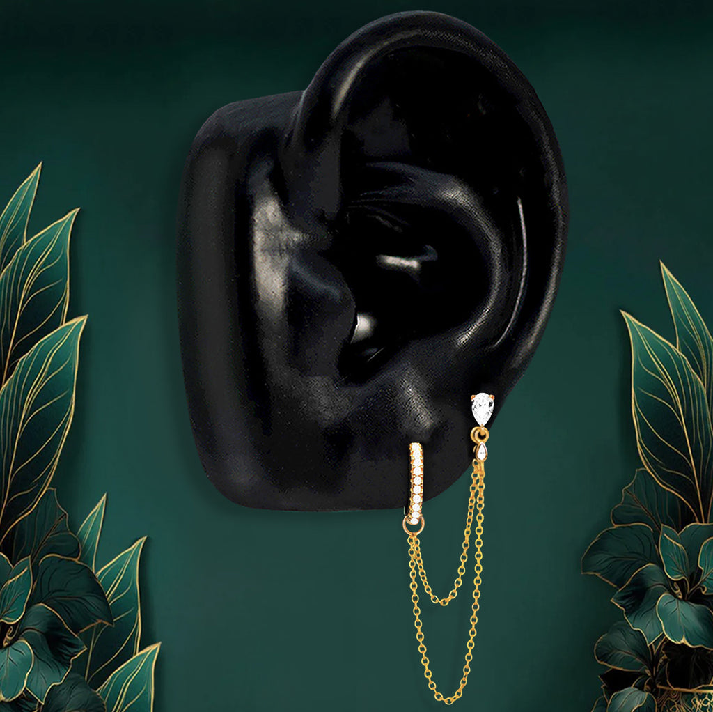 Gold double lobe piercing earrings with chain design