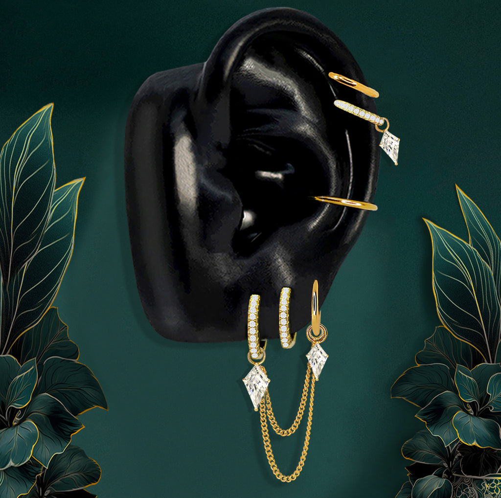 Gold drop earrings with hoops, kite pendants, and double chain