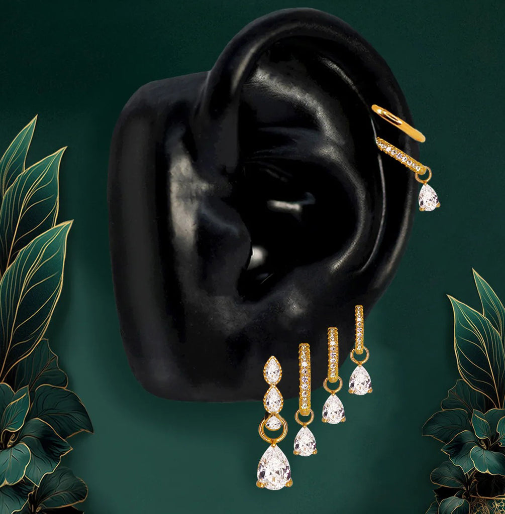 Gold teardrop earrings with pear-shaped stones