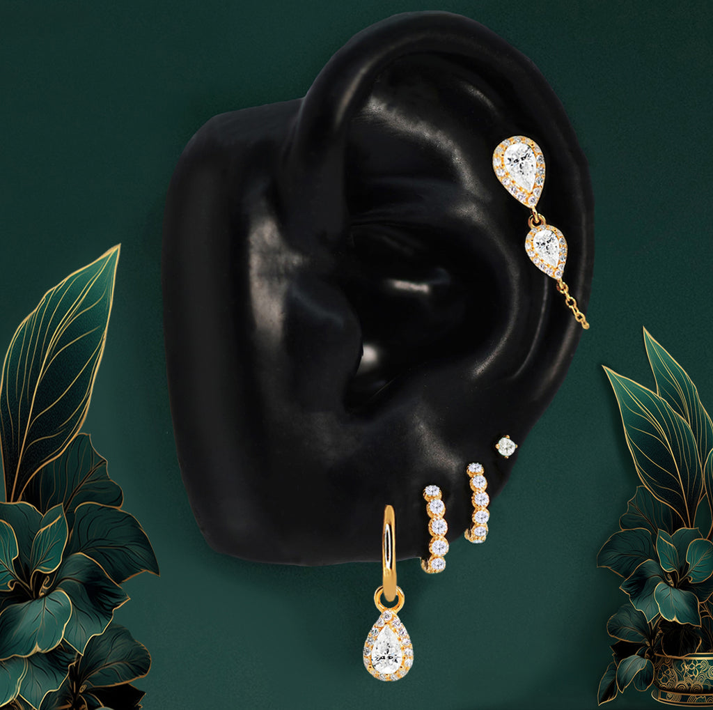 Gold wedding earrings with teardrop stones and hoops