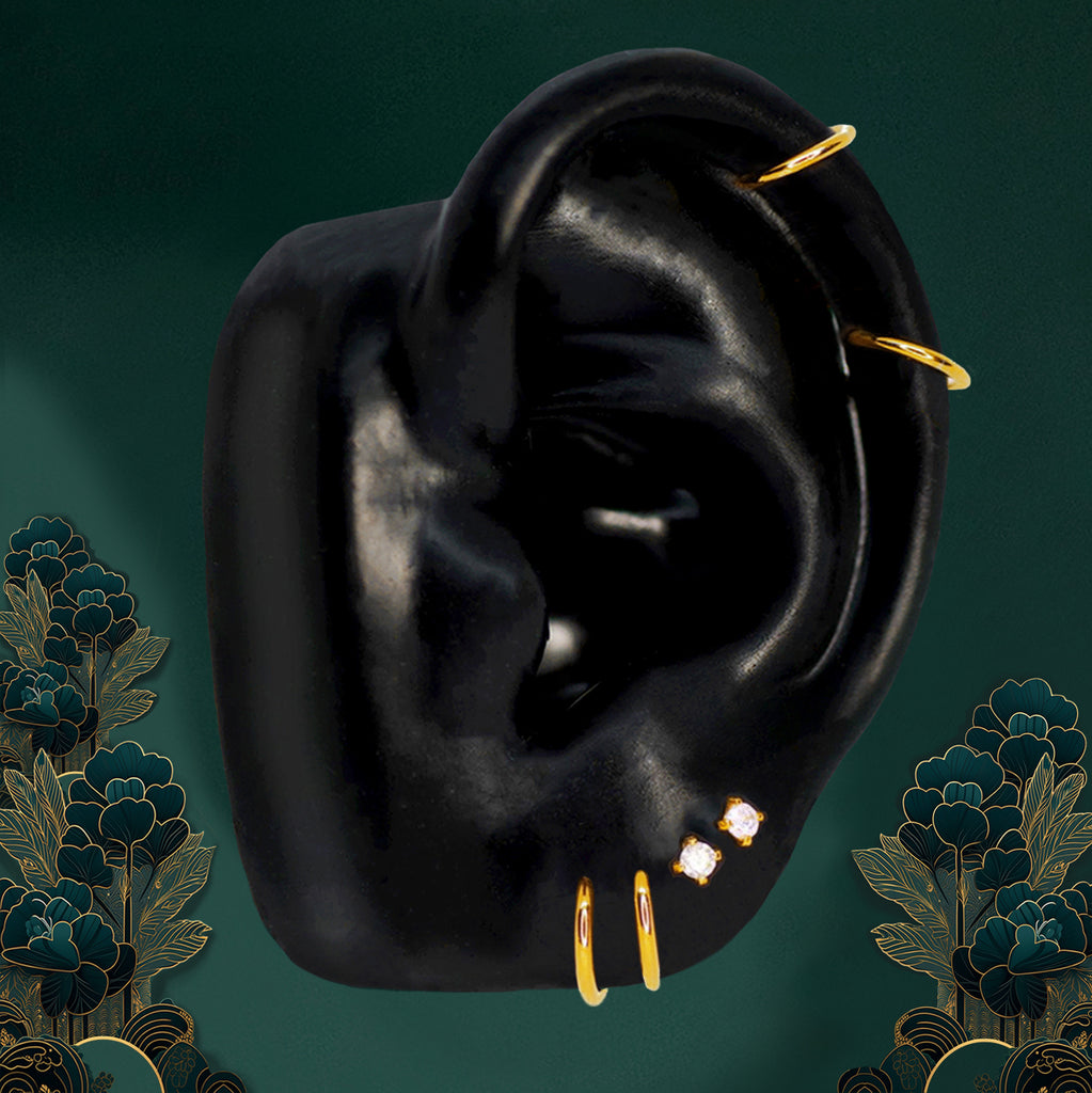 I Am Natasha small hoop earrings by IMBER, styled for a minimalist ear stack