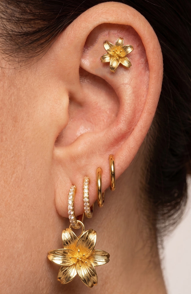 IMBER Lily Ear Stack Set in gold with lily drop, worn on model's ear