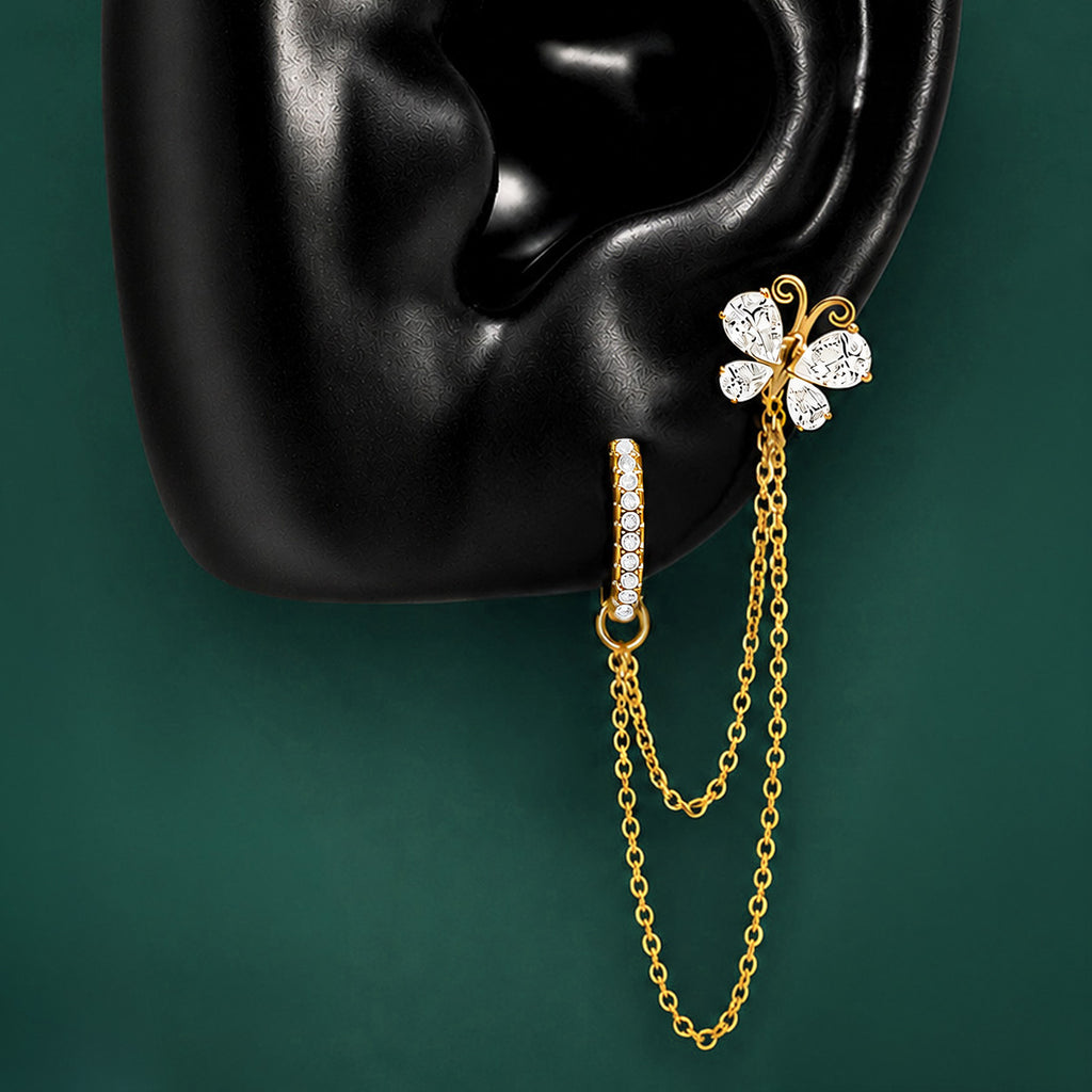 IMBER Metamorphosis Double Piercing White in gold sterling silver with white butterfly, on display